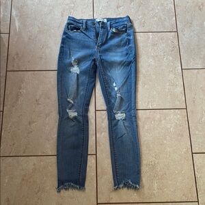Distressed Blue Jeans